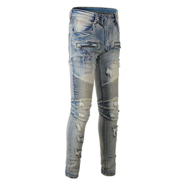Jean skinny homme stylé, coupe ajustée, détails biker et déchirés. Parfait pour look urbain tendance automne.