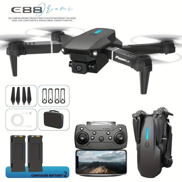Drone E88 en vol extérieur, double caméra capturant des panoramas stables et des vidéos aériennes fluides.
