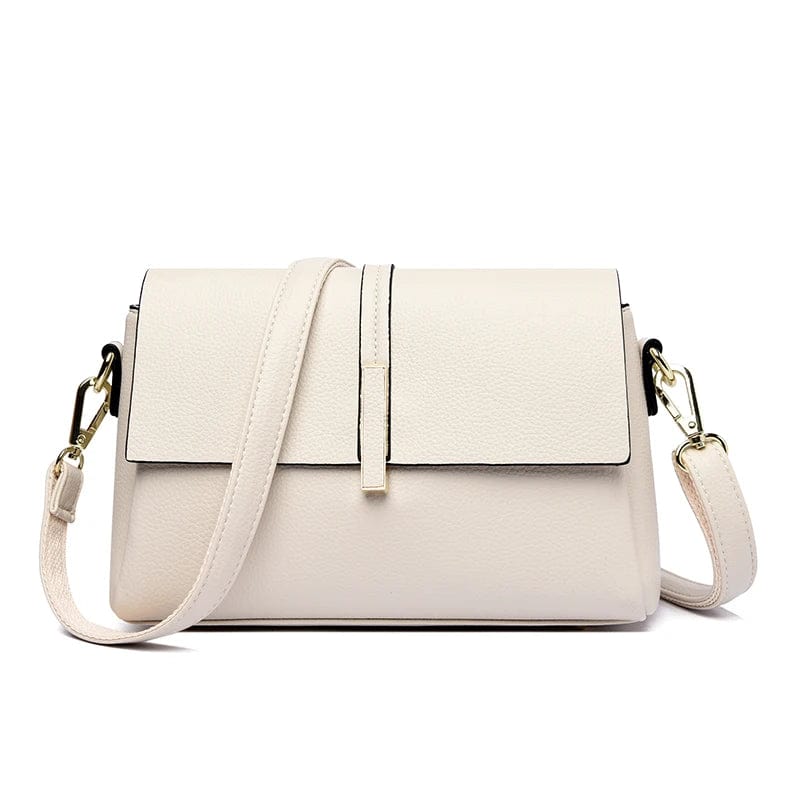 Sac bandoulière femme en cuir PU rouge, design besace chic. Accessoire de mode féminin et polyvalent.
