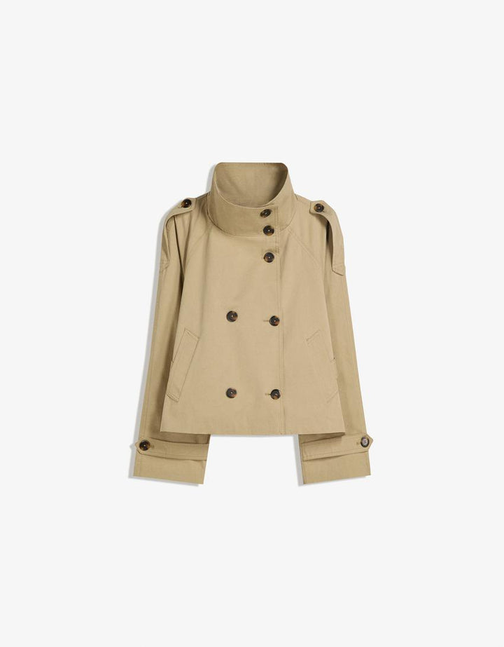Détail du trench court femme, tissu élégant, ceinture ajustable, style mode urbain printemps/automne.