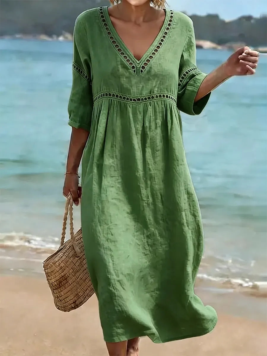 Robe femme coton col V coupe fluide, style décontracté élégant. Idéale printemps-été.