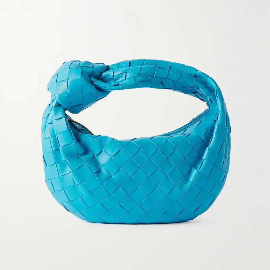 Sac à main en cuir véritable pour femme. Accessoire mode essentiel, intemporel, élégant et durable.