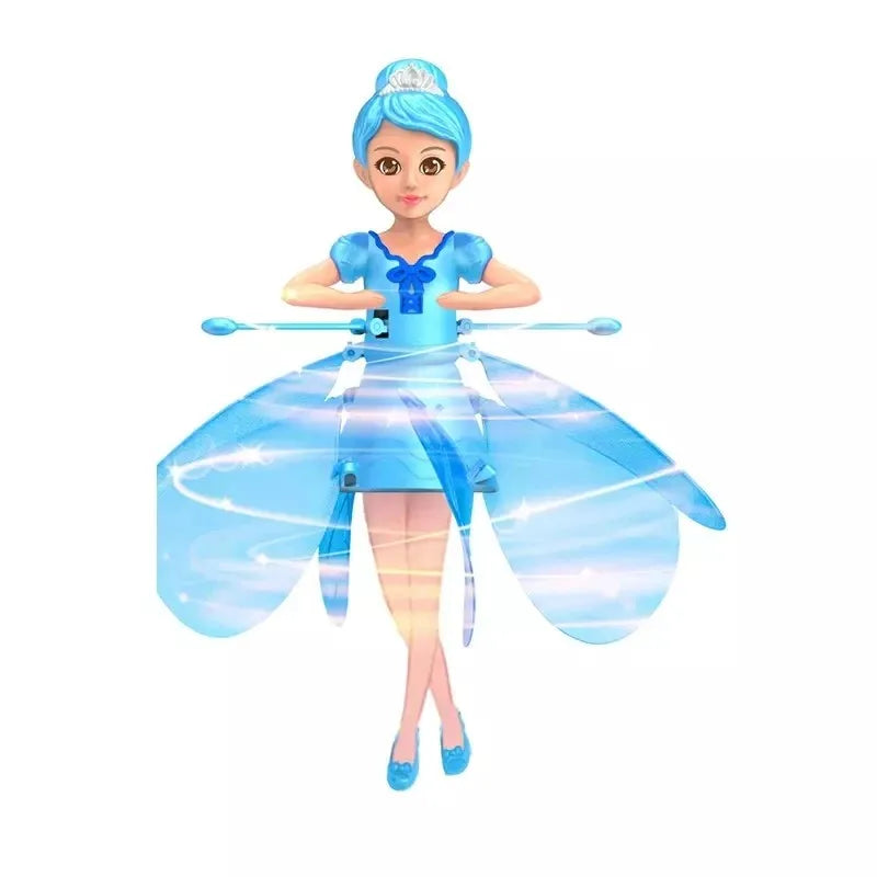 Jeune fille jouant avec sa poupée volante lumineuse, un jouet interactif pour jeu intérieur.