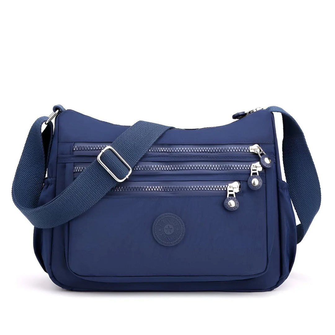 Sac de mode féminin, à bandoulière, imperméable et spacieux, design élégant pour garder vos affaires organisées.