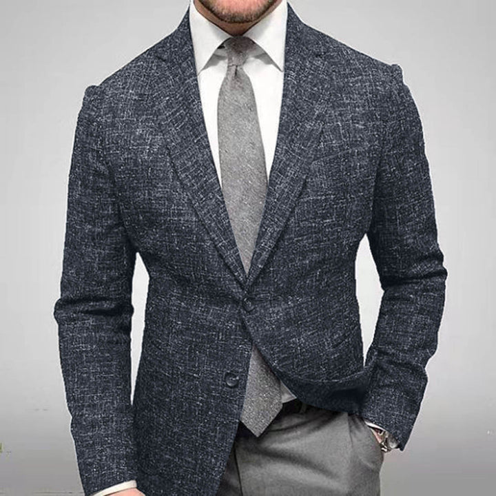 Veste blazer homme à carreaux avec revers crantés, idéale pour tenue smart casual ou habillée.
