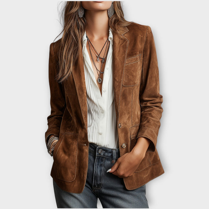 Blazer femme vintage, coupe ajustée. Élégante veste de bureau, parfaite pour une tenue professionnelle chic.