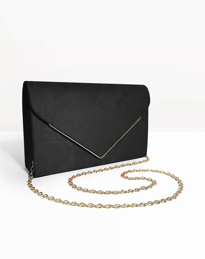 Pochette tendance velours aspect daim, accessoire indispensable pour soirée glamour.