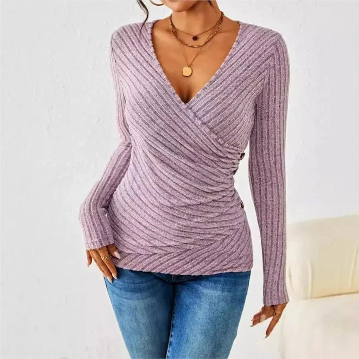 Blouse cache-cœur femme versatile, parfaite pour un style élégant au bureau ou confortable au quotidien.
