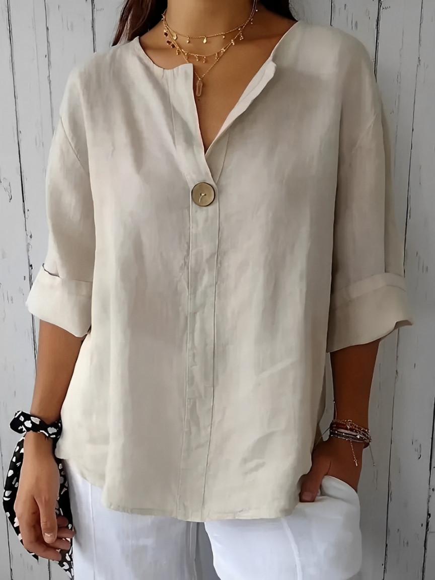 Blouse femme chic à col V et manches 3/4, idéale pour un look élégant et décontracté quotidien.