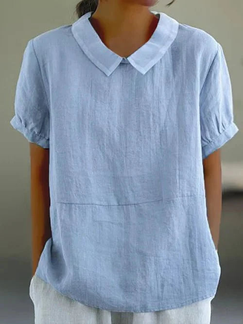 Blouse femme chic à col, manches courtes. Idéale pour un look décontracté élégant au bureau ou en ville.