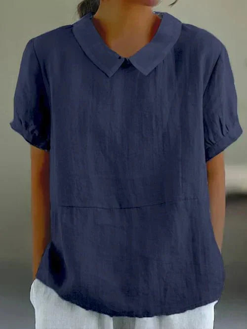 Blouse femme chic décontractée avec col et manches courtes. Confortable et élégante pour un look sophistiqué.