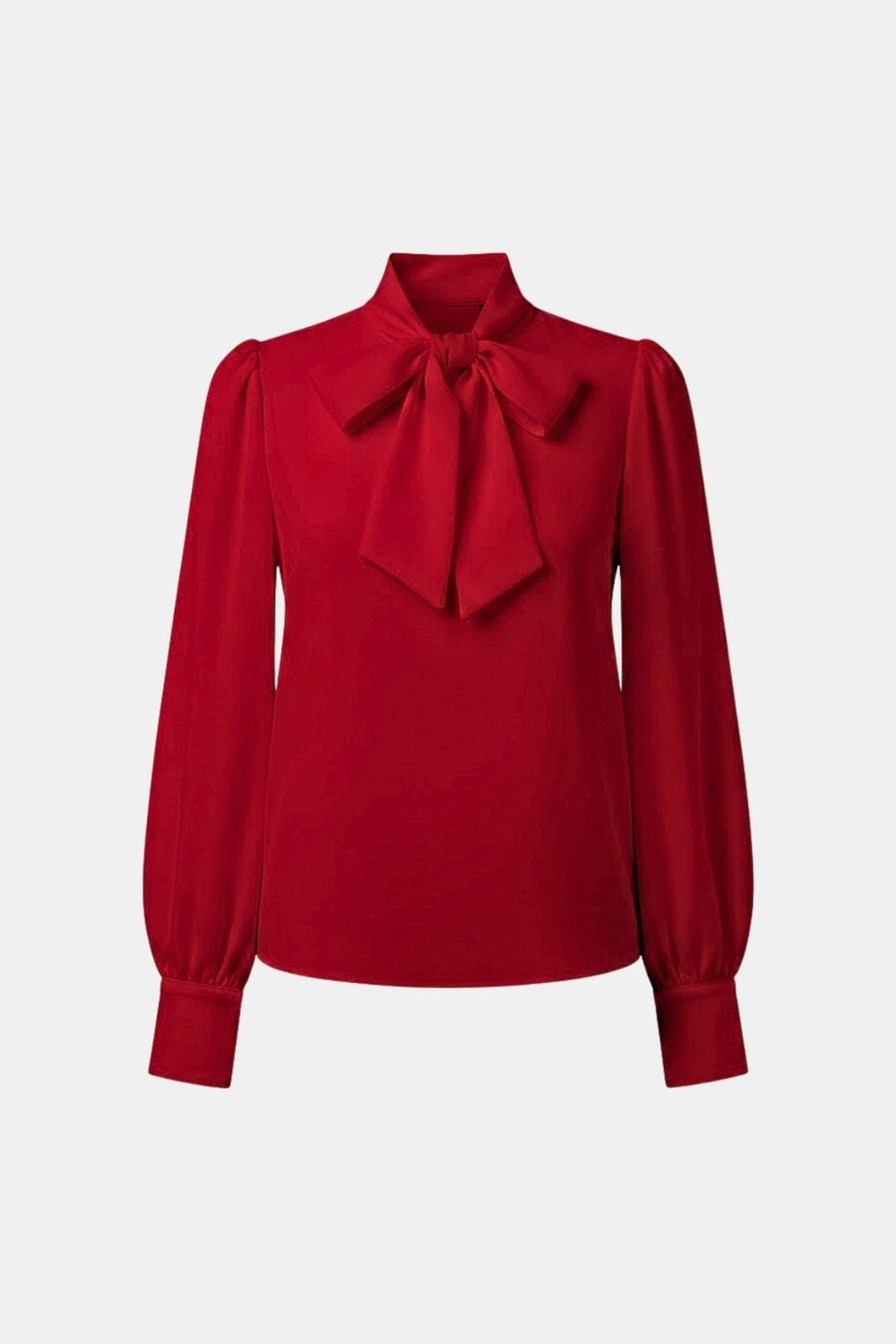 Haut femme chic en crêpe avec col lavallière, coupe fluide et manches longues pour un style polyvalent.