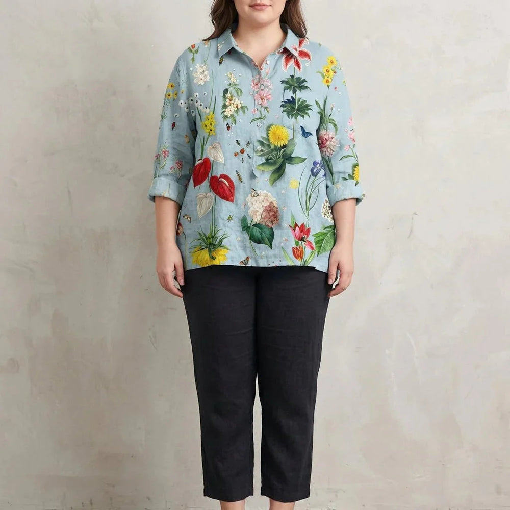 Élégante blouse d'été fluide pour femme, imprimé floral coloré, manches longues, style urbain confortable.
