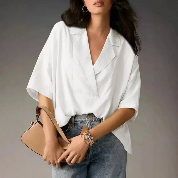 Blouse femme oversize chic et confortable avec manches tombantes et col revers. Idéale pour le printemps/été.