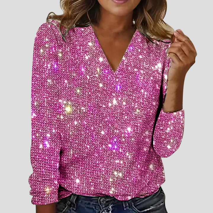 Blouse mode femme à paillettes entièrement recouverte. Col V élégant, manches longues. Parfaite pour une soirée ou fête.