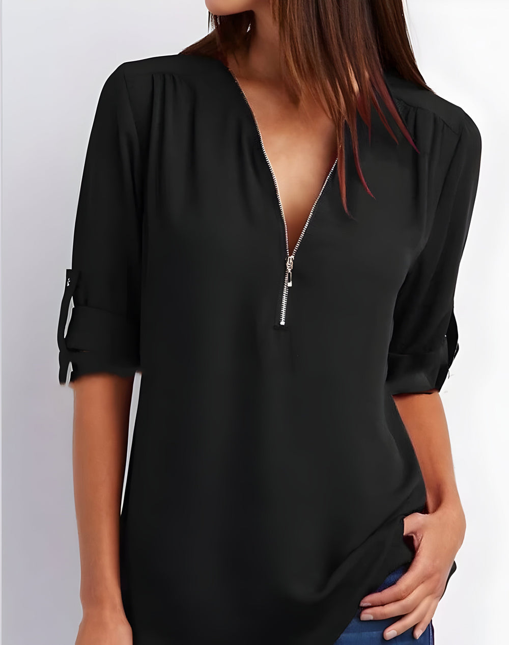 Chemisier zippé femme avec encolure V, manches retroussables, pour une élégance chic et moderne.