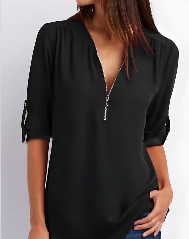Chemisier zippé femme avec encolure V, manches retroussables, pour une élégance chic et moderne.