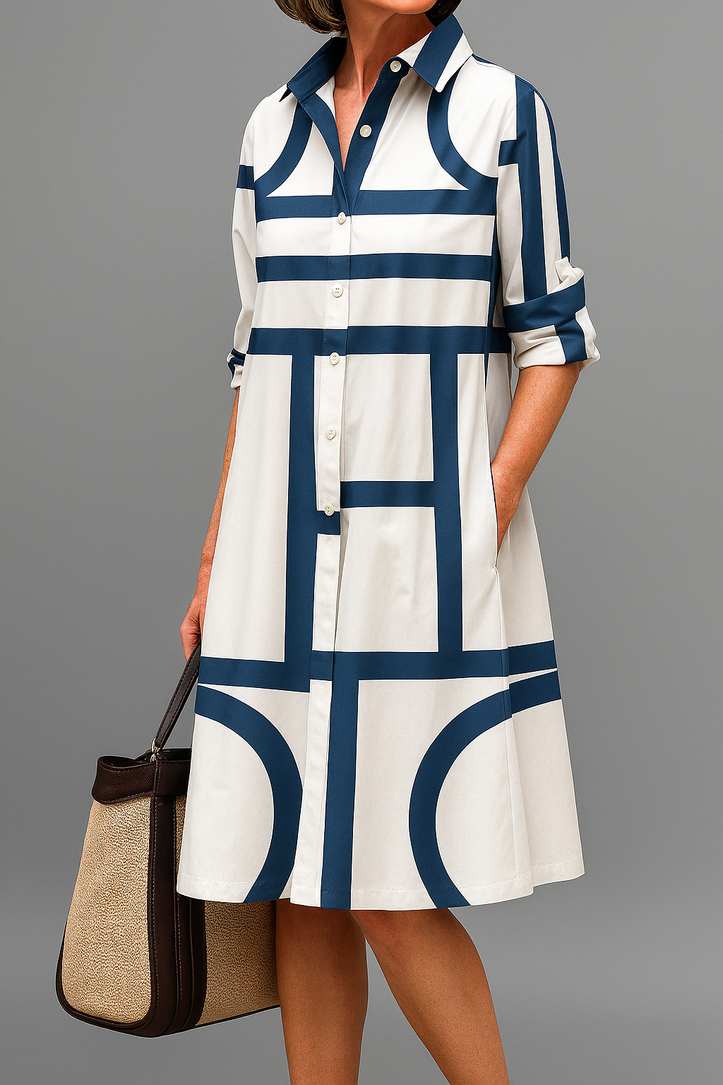 Robe midi femme élégante, coupe fluide, style sophistiqué. Idéale printemps/été, confort assuré.