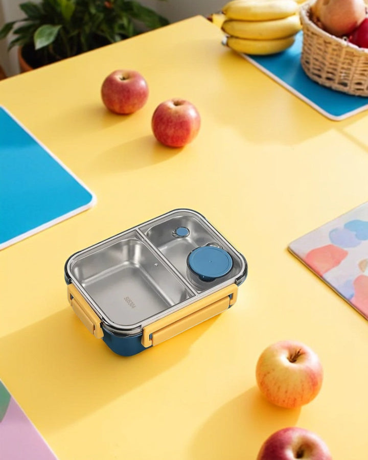 Lunch box verte en plastique, résistante et étanche, pour tous vos besoins alimentaires.