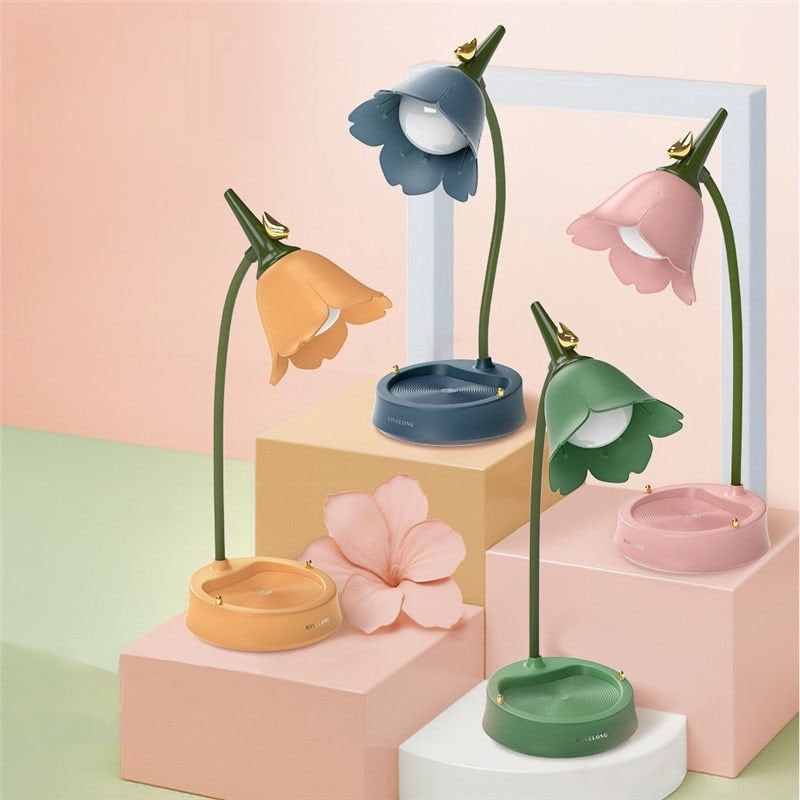Lampe de table LED design fleur, tactile et portable, pour bureau ou décoration intérieure moderne.