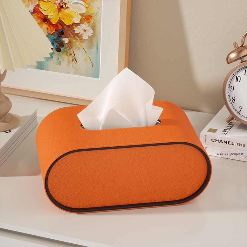 Boîte à mouchoirs ovale élégante pour bureau et salon, décorative et organisateur moderne.