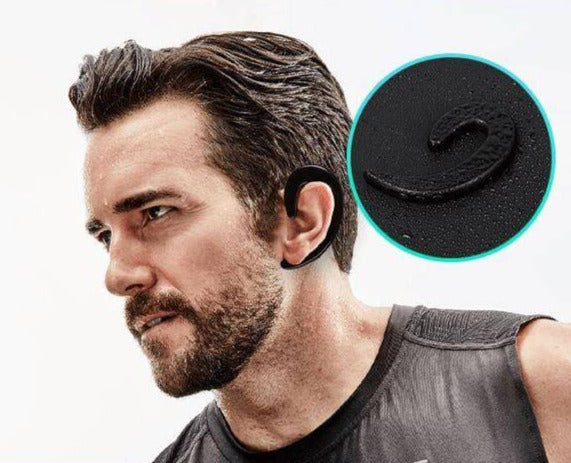 Athlète portant des écouteurs à conduction osseuse Bluetooth, pour sport, légers et très confortables.