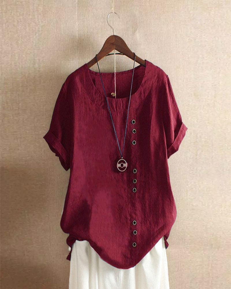 Vue arrière de la blouse femme légère. Coupe fluide décontractée, vêtement d'été élégant et confortable.