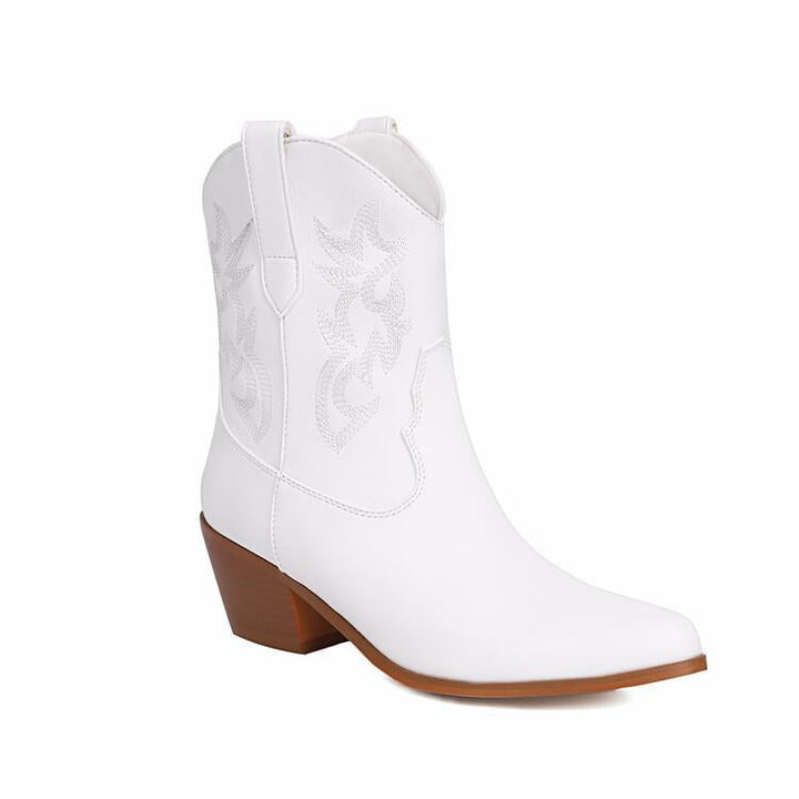Chaussures femme mi-hautes, bottes cowboy brodées, talon large, pour un look western chic et moderne.
