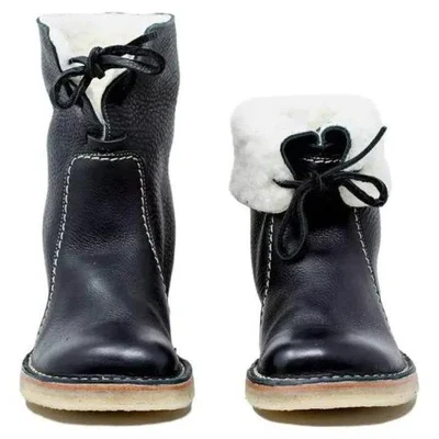 Bottes d'hiver robustes et imperméables pour homme, idéales pour affronter le froid et la neige avec confort.