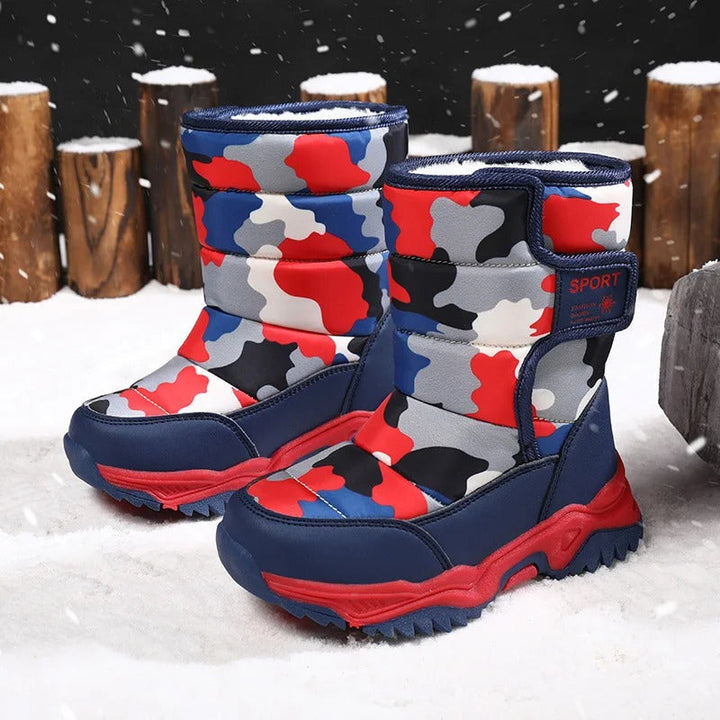 Bottes d'hiver enfant, conçues pour garder les pieds au sec et au chaud grâce à leur imperméabilité.
