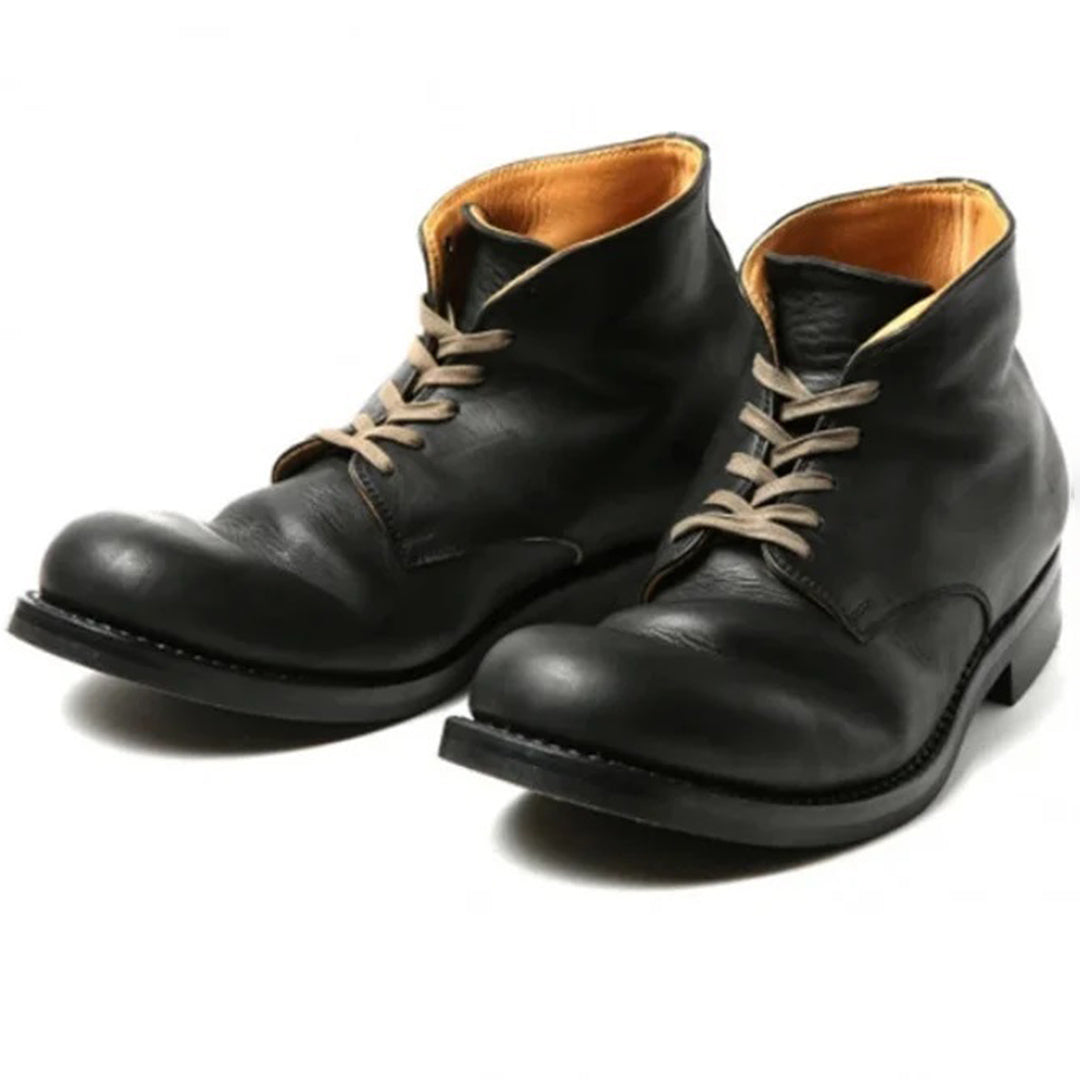Bottes homme élégantes et confortables, parfaites pour un style sophistiqué en ville ou au bureau.