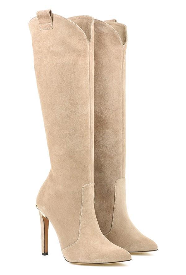 Bottes cuissardes ajustées pour femme, design élégant et confort pour l'automne et l'hiver.