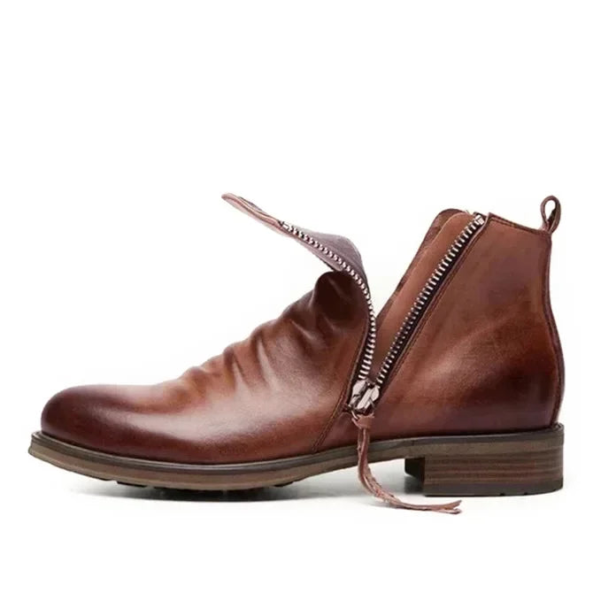 Semelle durable de bottines Chelsea homme, offrant adhérence et confort. Idéales pour l'hiver.
