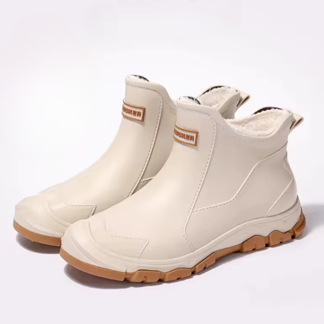Bottines homme confortables et imperméables, parfaites pour le travail en extérieur et la protection contre la pluie.