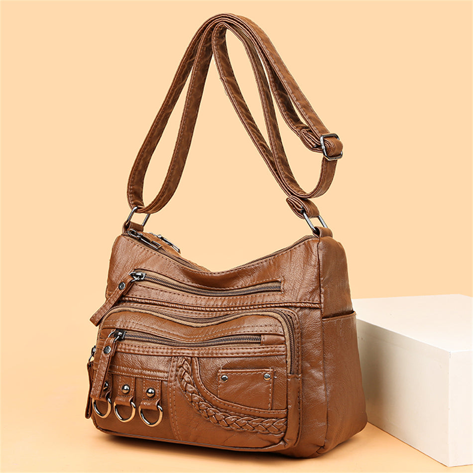 Sac à main vintage élégant pour femme, accessoire de mode intemporel marron.