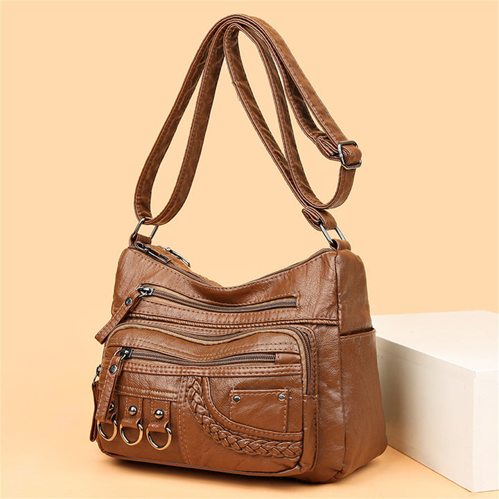 Sac à main vintage élégant pour femme, accessoire de mode intemporel marron.