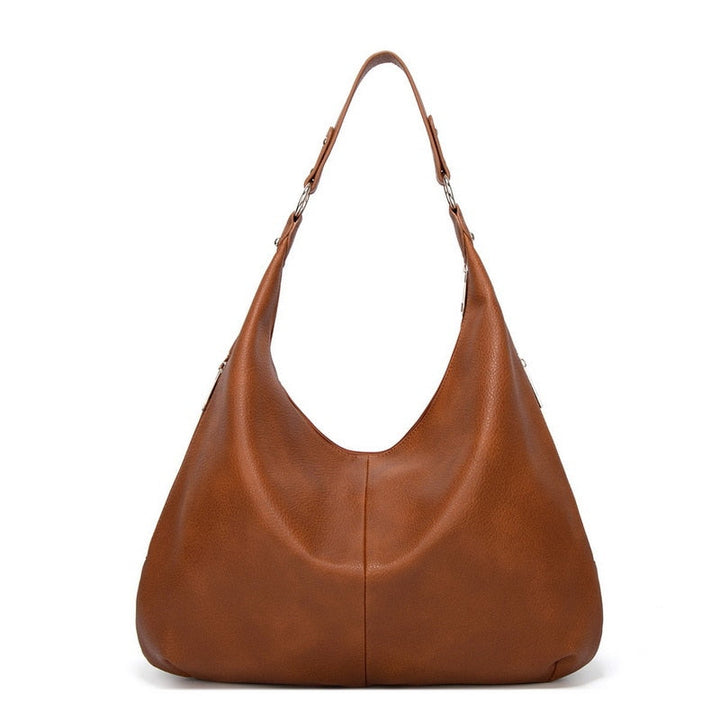 Sac à main Mila, design épuré, élégance intemporelle pour la femme moderne et active.