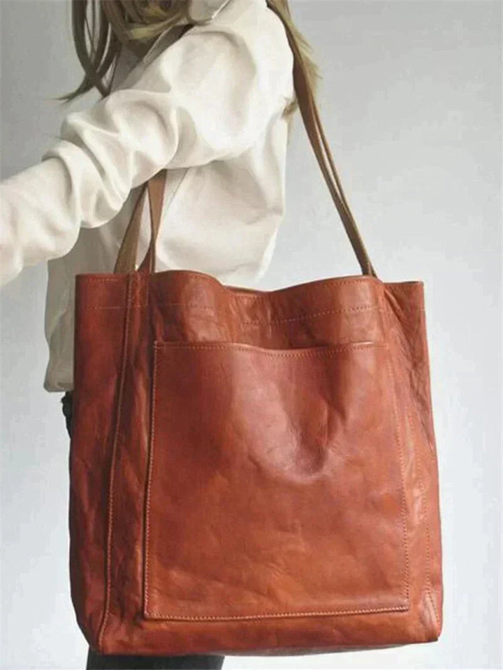 Sac à main cabas tendance pour femme, design moderne et finitions élégantes, parfait pour tout look.