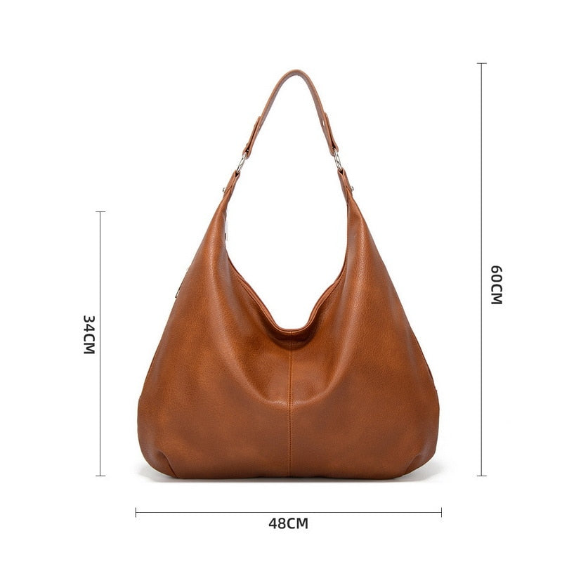 Sac à main Mila noir, élégant et polyvalent, idéal pour un usage quotidien chic et raffiné.