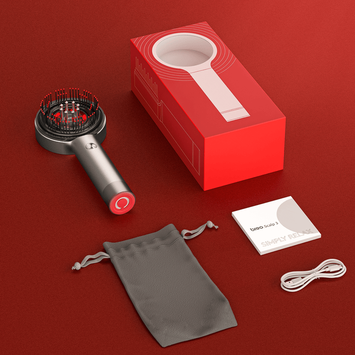 Peigne de massage Thera pour cuir chevelu, lumière rouge pour revitalisation et soin des cheveux.