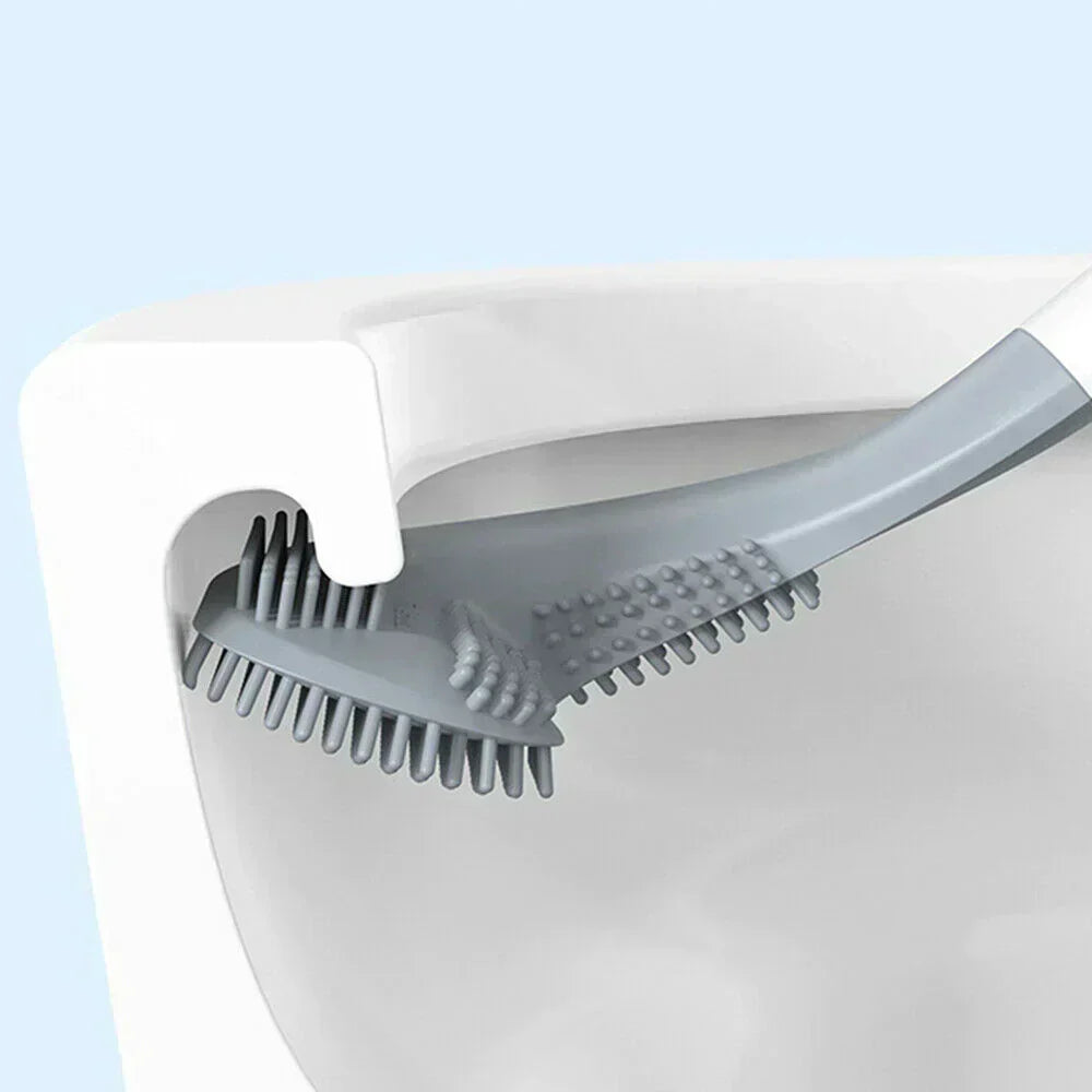 Brosse WC en silicone flexible, hygiénique et durable, avec support mural discret pour un nettoyage impeccable des toilettes.