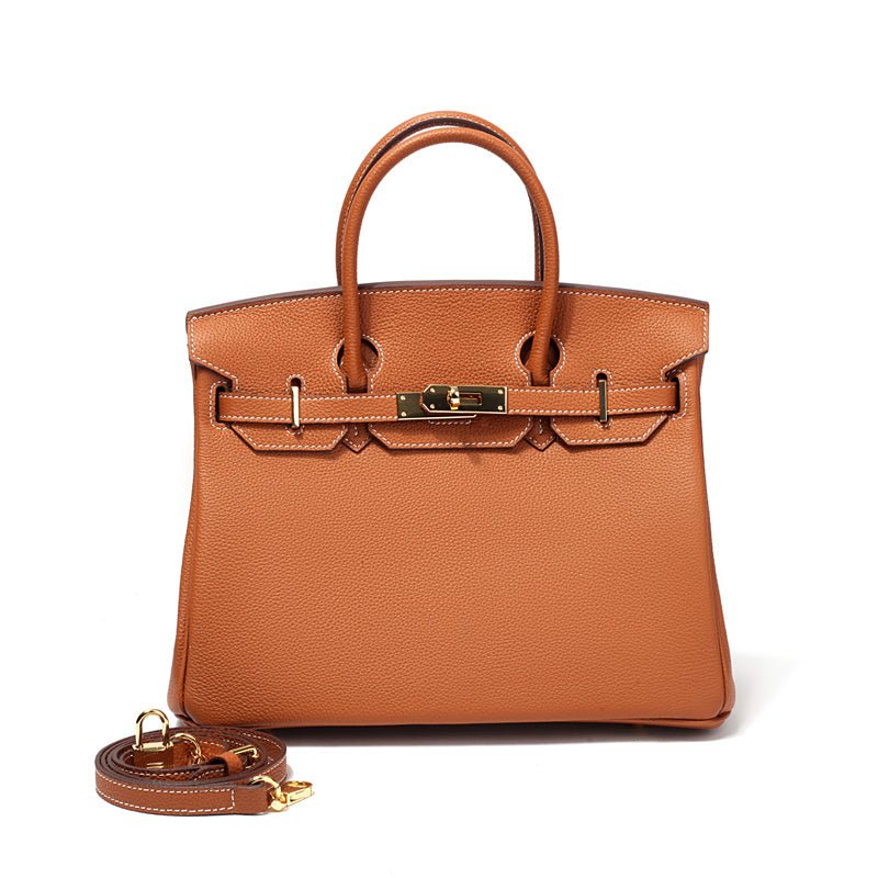Sac à main en cuir noir, un accessoire classique et chic pour toutes occasions.