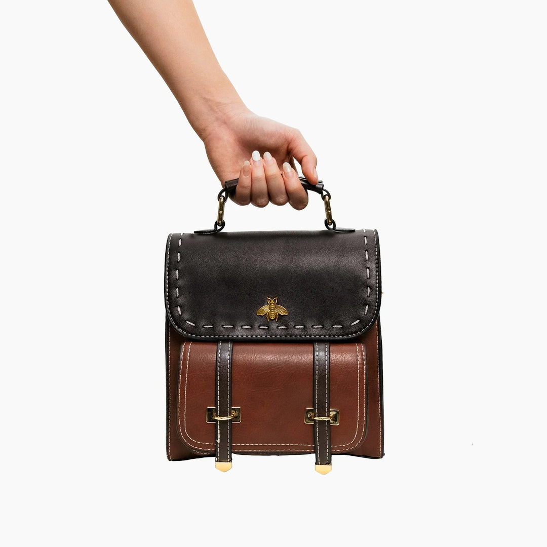 Sac à dos marron Bella, élégant et robuste pour vos aventures de voyage.
