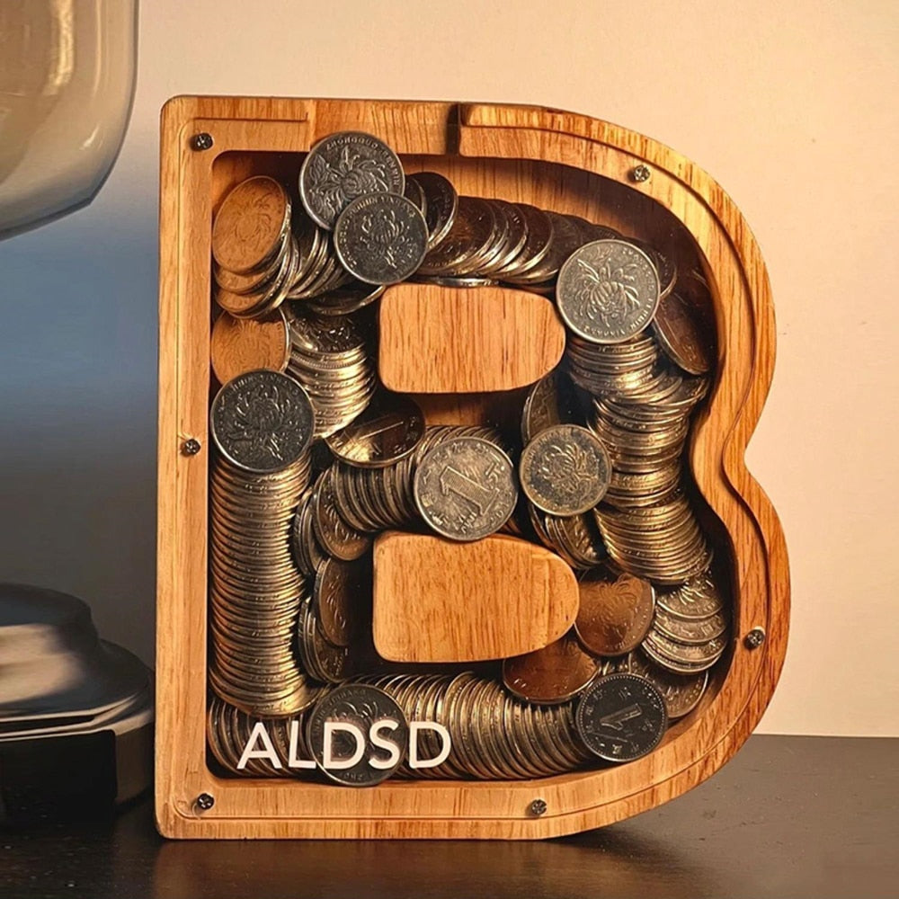 Tirelire alphabet en bois pour enfant, cadeau éducatif et personnalisé.