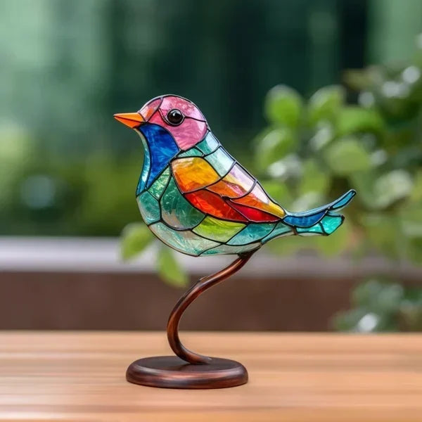 Décoration élégante oiseaux en verre coloré, sculpture artisanale lumineuse pour intérieur moderne.