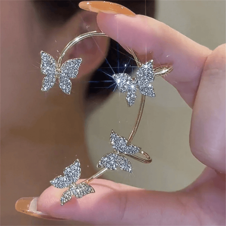 Profitez du confort des boucles d'oreilles papillon à clip hypoallergéniques en argent, sans perçage.