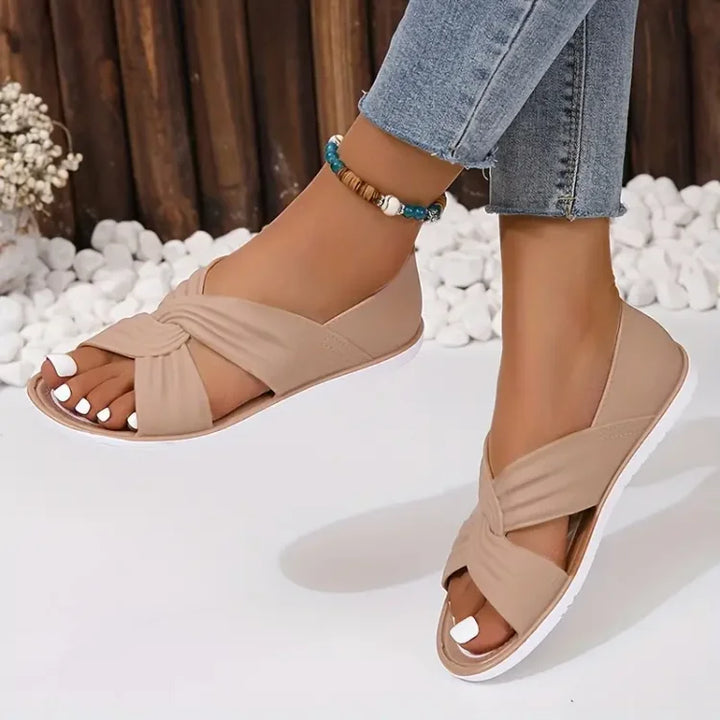 Sandales plates confortables avec nœuds, style décontracté pour femme en été.