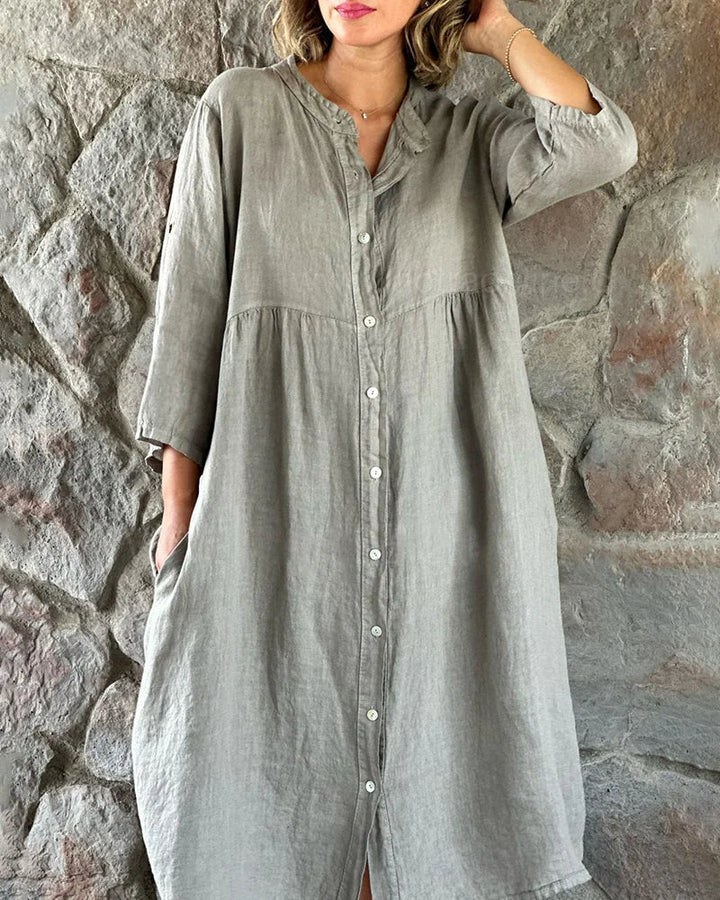 Élégante robe chemise femme Alya fluide. Coupe midi polyvalente pour bureau, printemps et été. Confort chic garanti.