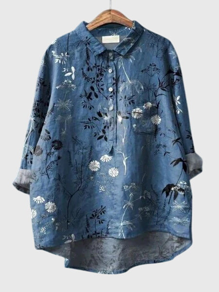 Blouse florale élégante, tissu léger et coupe confortable, parfaite pour l'été.