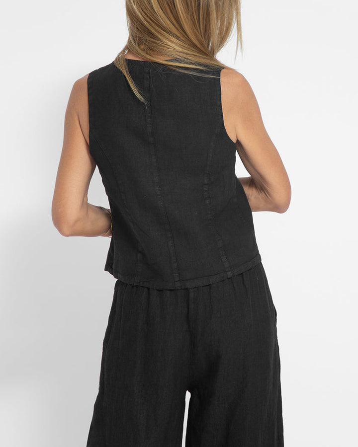 Ensemble deux pièces en lin pour femme, gilet élégant et pantalon ample.